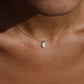 White Opal Pendant - 9K Yellow Gold