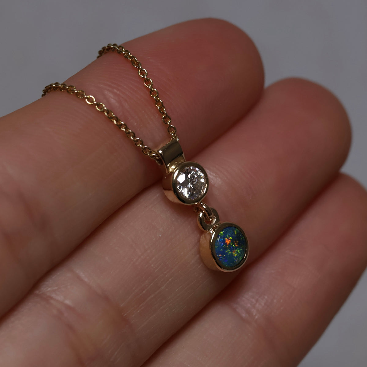 Black Opal and Lab Diamond Pendant - 9K Yellow Gold