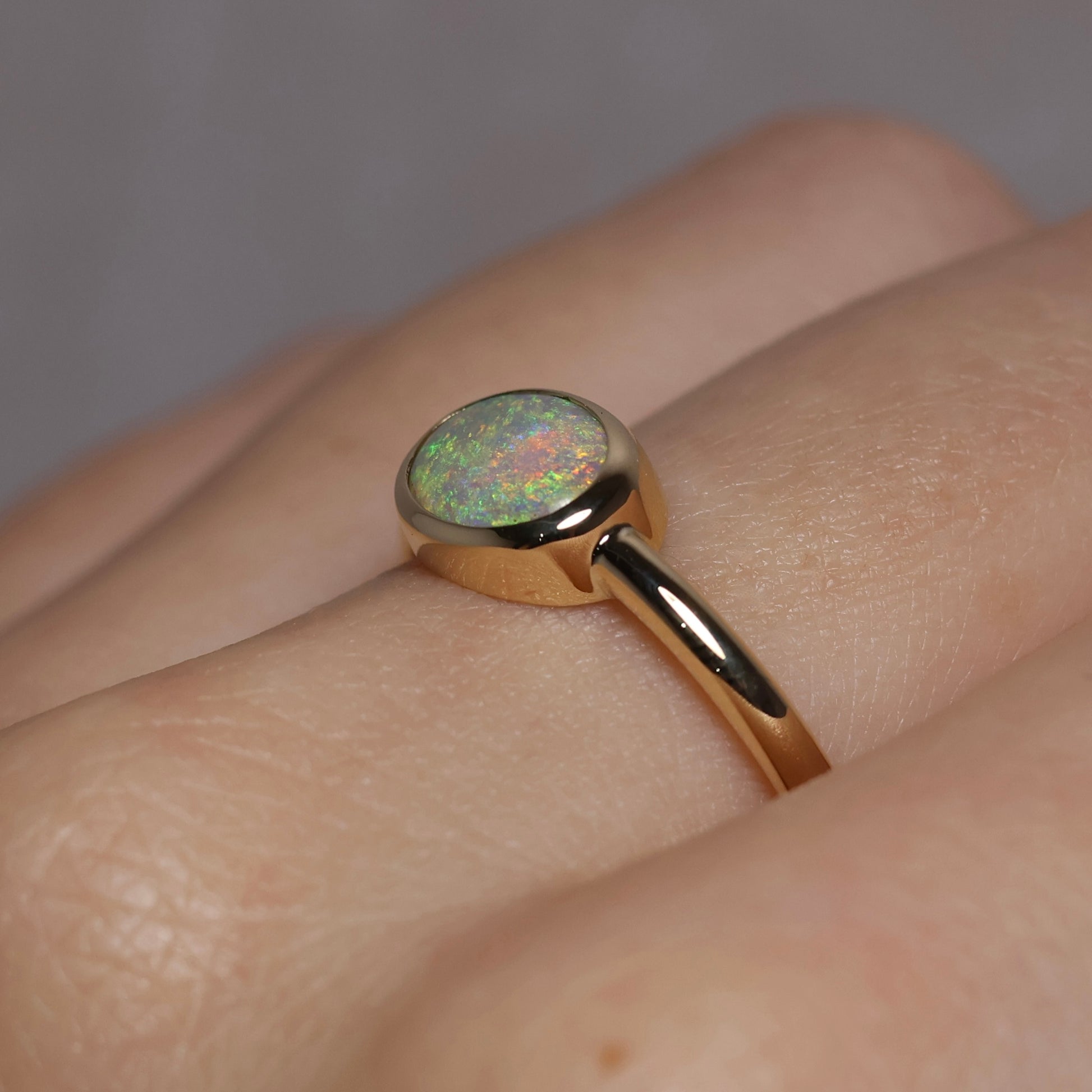 Oval Opal Ring - 9K Yellow Gold