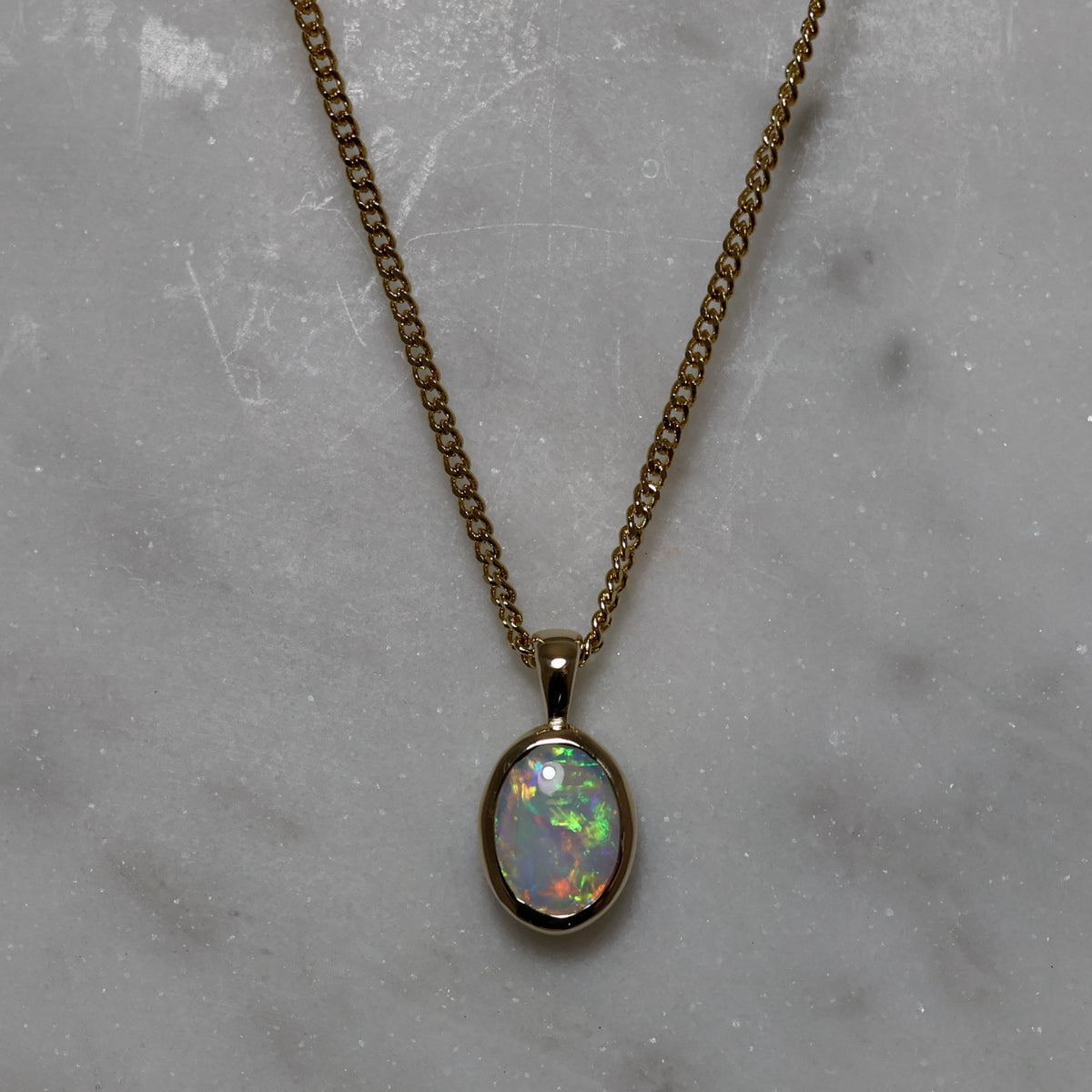 Crystal Opal Pendant - 9K Yellow Gold