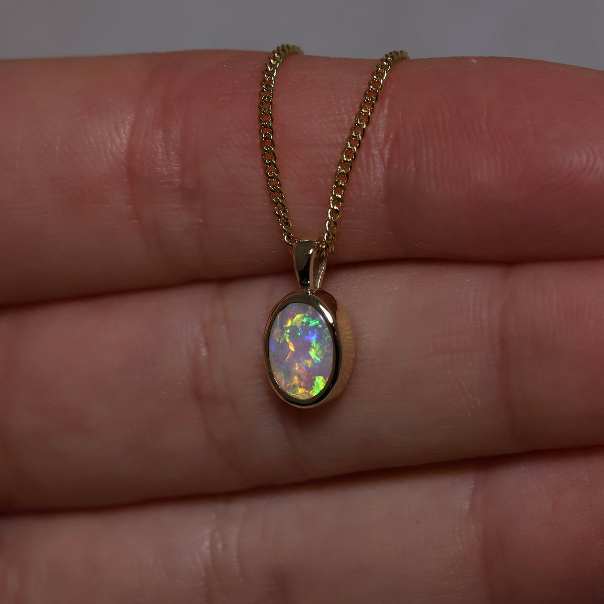 Crystal Opal Pendant - 9K Yellow Gold