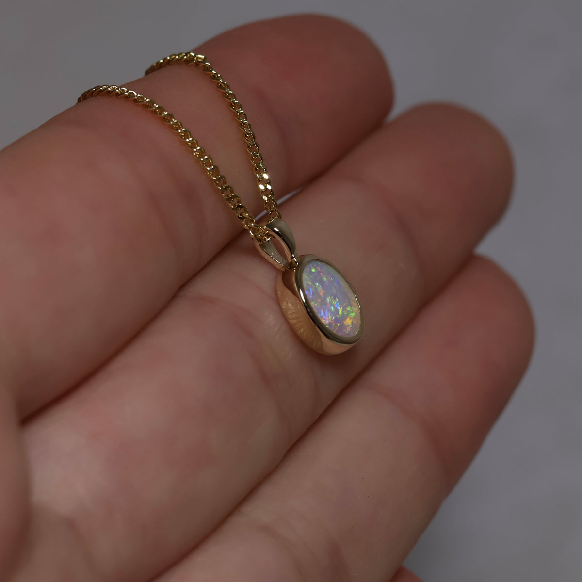 Crystal Opal Pendant - 9K Yellow Gold