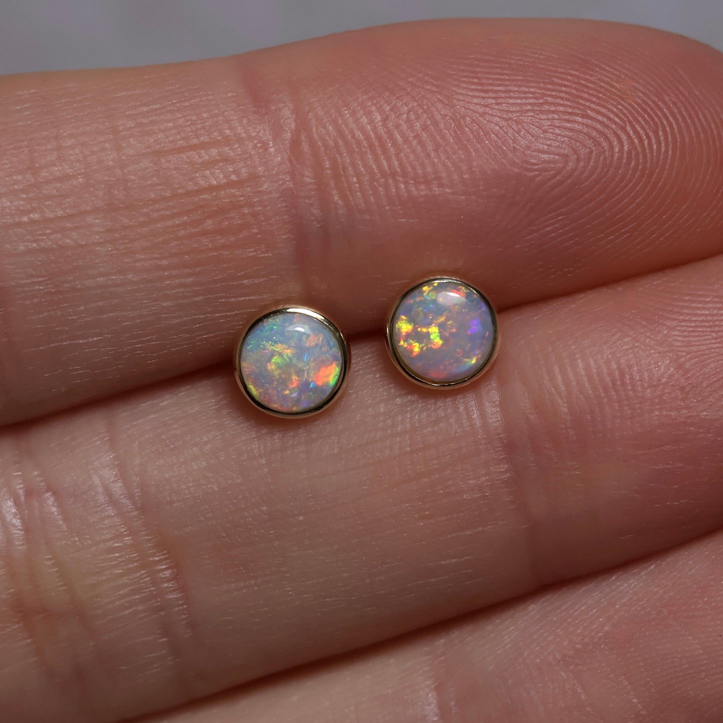 14k yellow gold studs with butterfly backing.