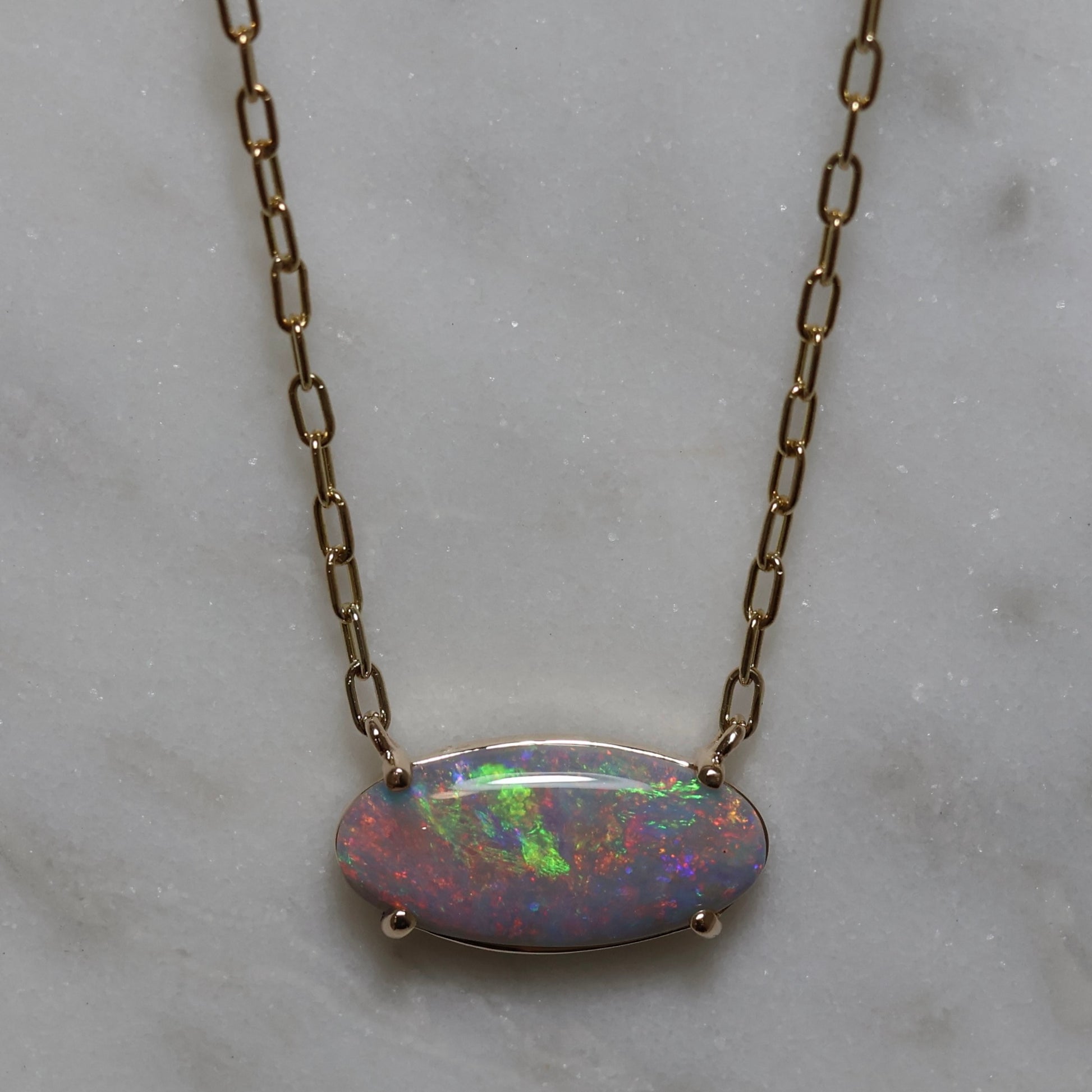 Semi Black Opal Pendant - 9K Yellow Gold.