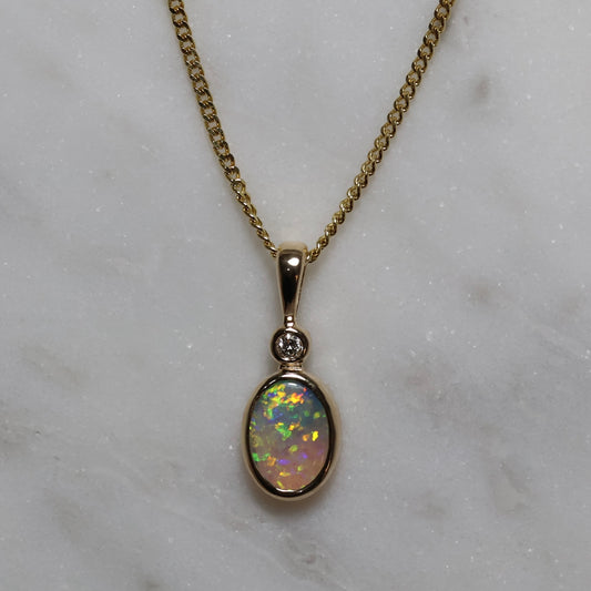 Opal Pendant With Diamond - 9K Yellow Gold